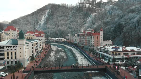 Winter Famous Alpine Ski Resort Red Polyana in Small Mountain Town with River