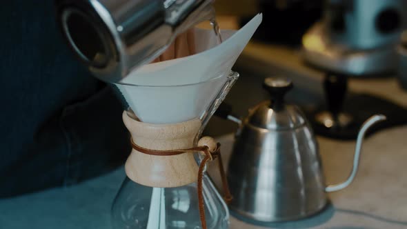 Process of making espresso in a coffee machine. alt