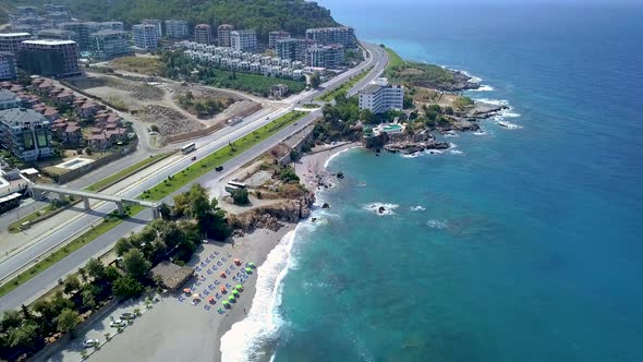 Beach resort town by blue sea alt