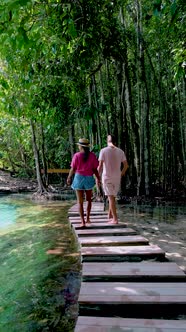 Couple Visiting Emerald Pool in Krabi Thailand Emerald Pool and Blue Pool Krabi Thailand alt