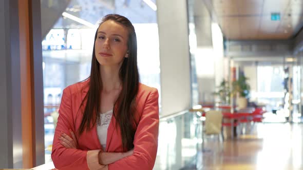 A Portrait of a Confident Successful Business Woman Looking at the Camera and Smiling