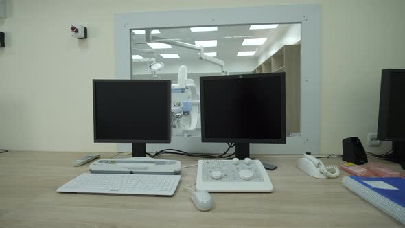 Control panel. Empty surgery. Cardio-vascular examination. Angiograph. Computer. alt