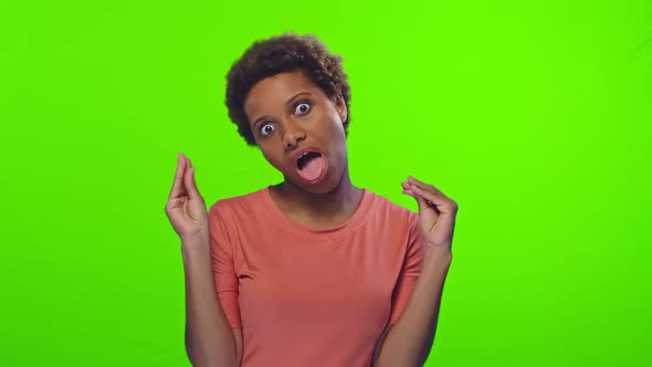 Young Dark Skinned Woman Shows Blah Blah Gesture Hands Symbol of Speaking Mouth alt
