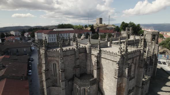 Heritage landmark in Portugal, Guarda catholic church close up, aerial view of the rooftop