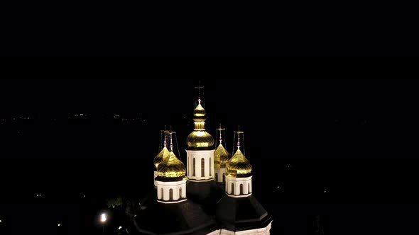 Church With Golden Domes at Night