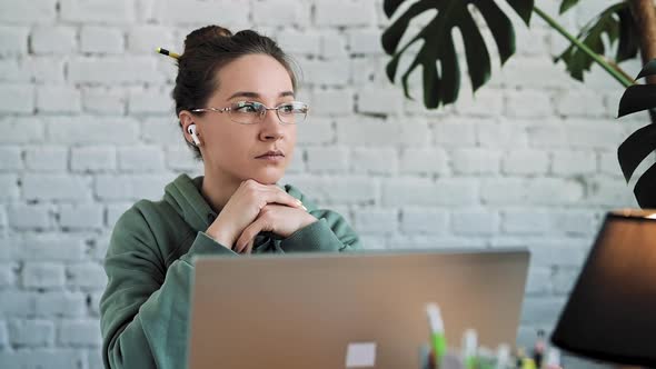 Serious White Girl Student Typing on Laptop Preparing Course Work alt