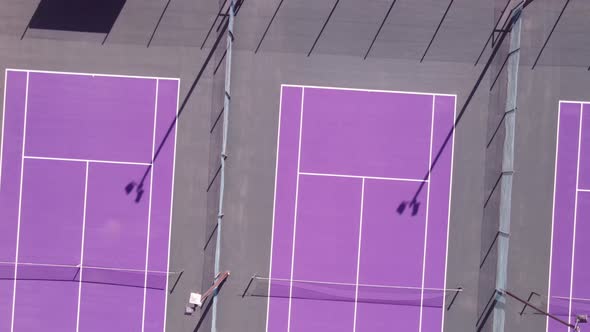 Drone Flying Over Bright Colored Tennis Courts