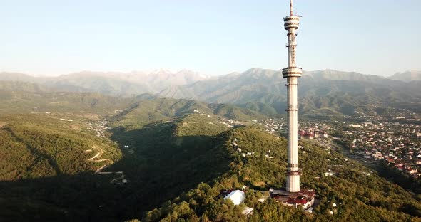 The High Tv Tower in Kok Tobe. a Panorama of The Green Mountains and Part of The City of Almaty alt