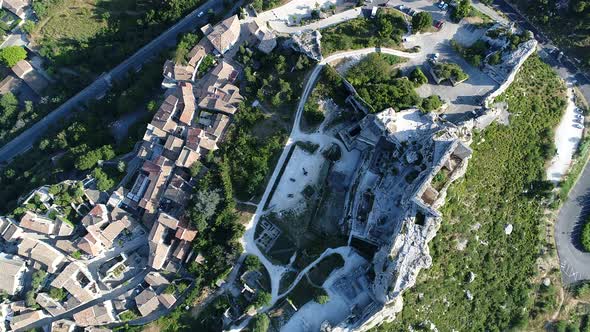 Village of Les Baux-de-Provence in Bouches-du-Rhone in France from the sky alt
