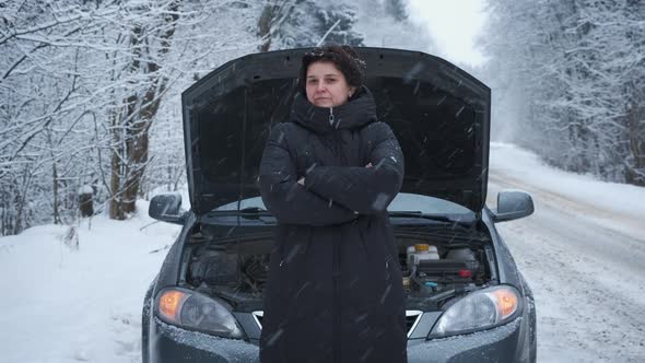 Woman in the Winter Forest on the Road Cold Warm Hands Waiting for Help Opened the Hood