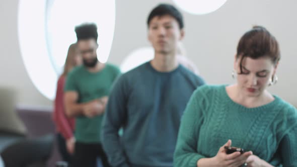 Group of Adults waiting in line