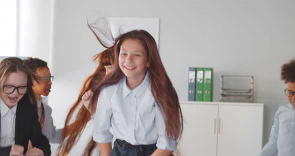 Happy Diverse Children Colleagues Dance Having Fun in Office alt