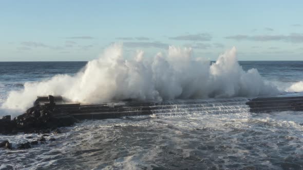 Powerful Storm Waves Crashing Against the Shore alt