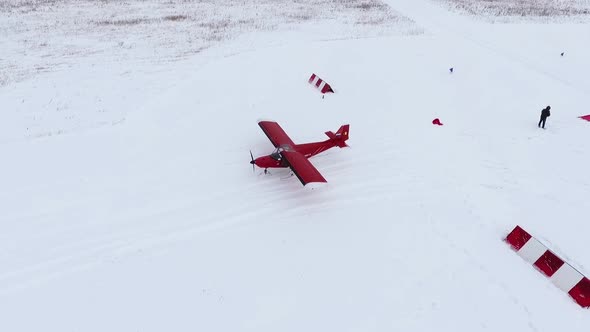 Red light aircraft Savannah. View from a height in winter alt