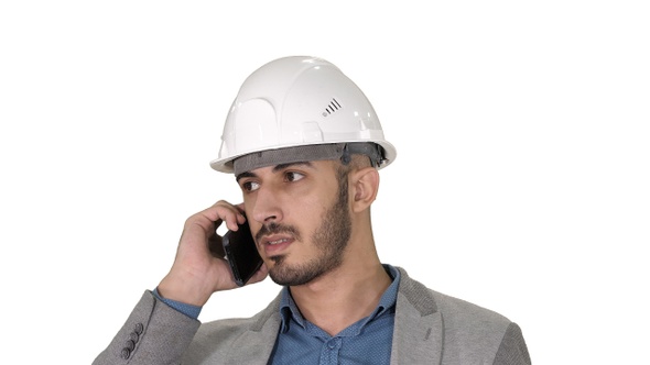 Engineer talking a mobile phone inspecting construction alt