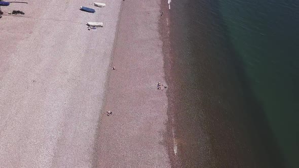 Aerial view of an almost empty beach in Budleigh Salterton, East Devon, England alt