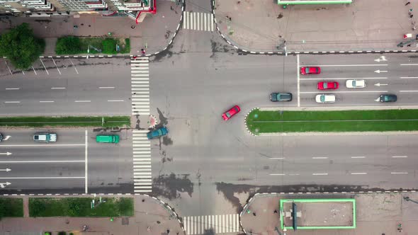 Cars Pass City Intersection of
