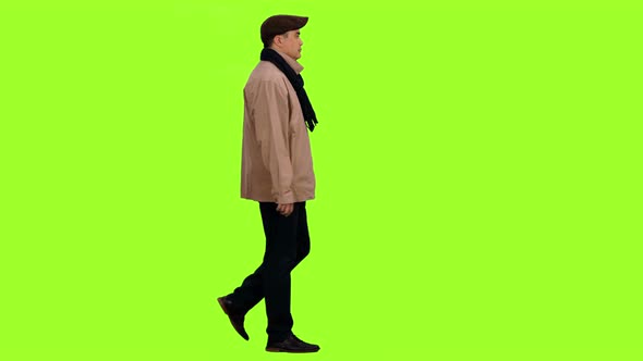 Walking Elegant Man in Jacket with Scarf and Flat Cap 