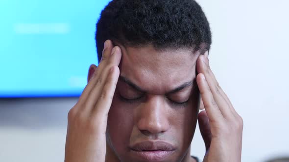 Headache, Upset Young Black Man Close Up alt