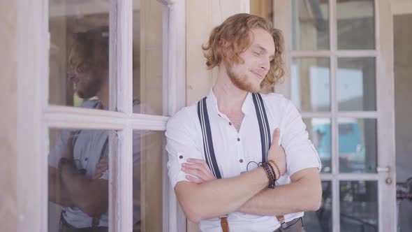 A man near countryside house alt