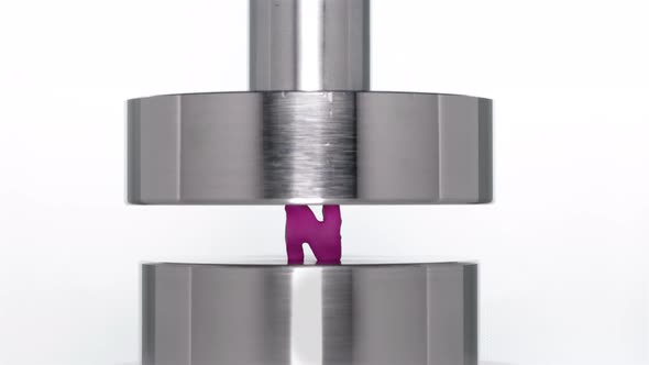 The Appearance of the Letter N When Lifting a Rod From a Hydraulic Press alt