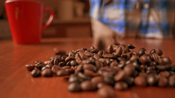 Camera Move Around Falling Coffee Beans on the Table alt