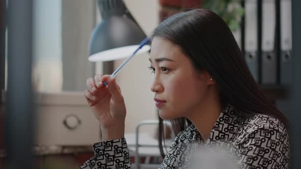 Close Up of Business Woman Thinking About Marketing Strategy alt