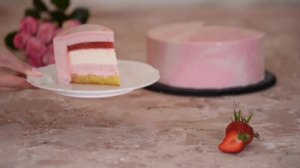 Piece of Delicious Strawberry Mousse Cake with Mirror Glaze