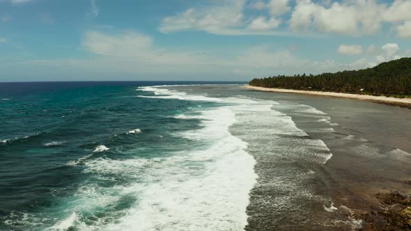 The Coast of Siargao Island, Blue Ocean and Waves alt