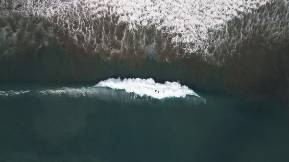Aerial View Of big waves in Dominical Beach in Costa Rica, Top Down Wide Shot alt