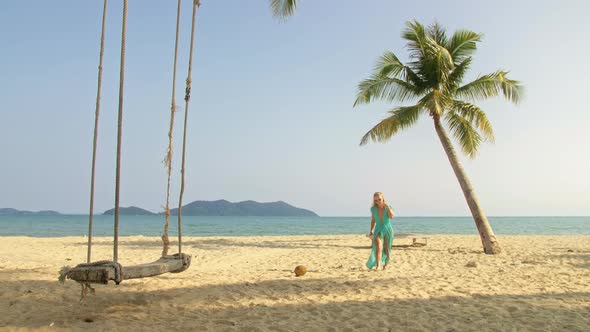 Woman Spends Her Vacation at the Seaside alt