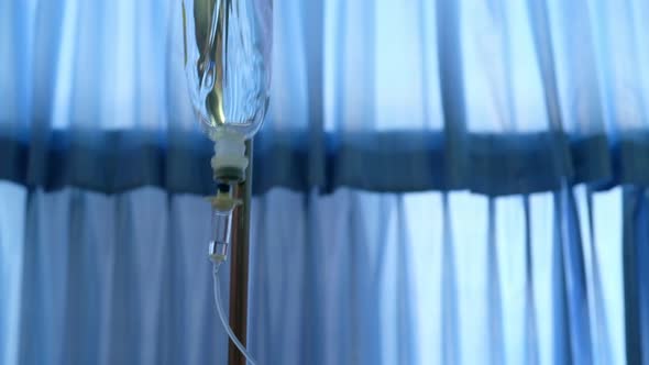 Normal saline hanging and drop for intravenous in hospital.