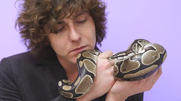 A Snake on a Man's Hand