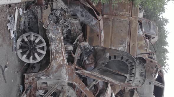 Vertical Video of a Dump of Wardestroyed Cars in Ukraine alt
