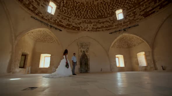 Brides in Ancient Temple Hall in Greece
