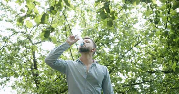 the Man Throws Out the Bottle and Immediately Gets a Pile of Garbage on His Head alt