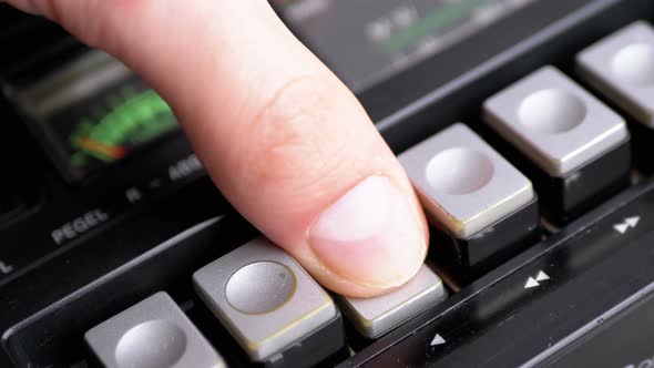 Pushing Play Button on a Vintage Tape Recorder. Transistor Retro Radio. alt