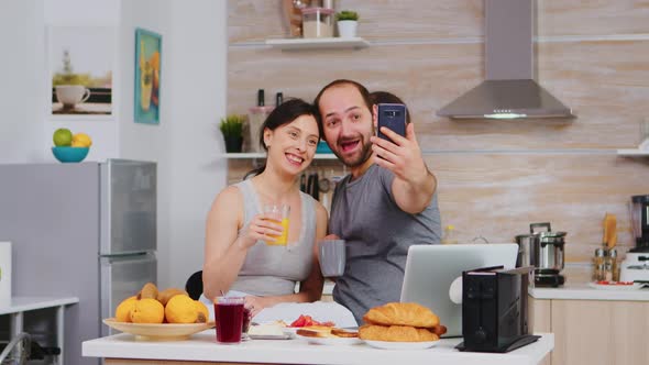 Taking Selfie During Breakfast alt