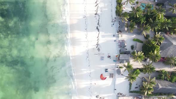 Vertical Video of the Ocean Near the Coast of Zanzibar Tanzania Aerial View alt