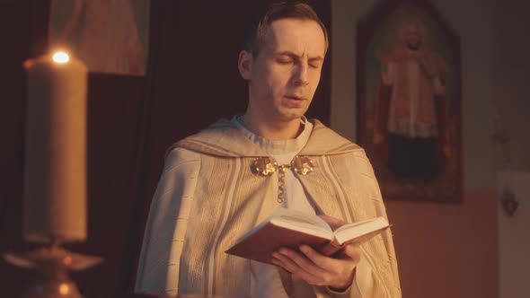Priest Preparing for Mass in Catholic Church alt