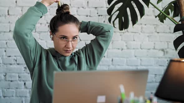 Serious White Girl Student Typing on Laptop Preparing Course Work alt
