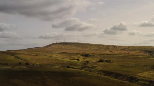 A drone view of Winter Hill and moorland in Bolton, Lancashire alt