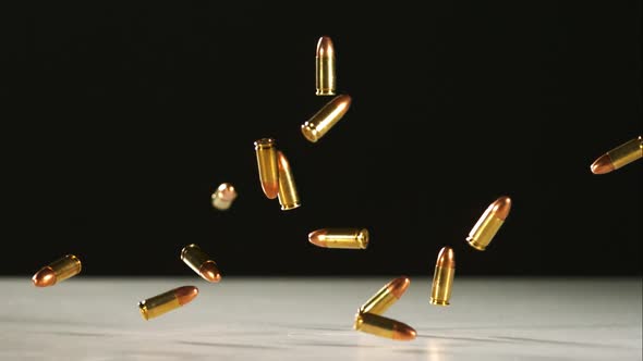 Bullets falling bouncing in ultra slow motion 1500fps on a reflective surface - BULLETS PHANTOM  alt