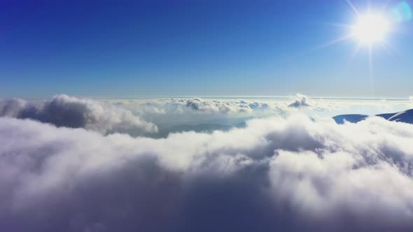 Wonderful View of Extraordinary Cloudy Valley and Bright Orange Sunset alt