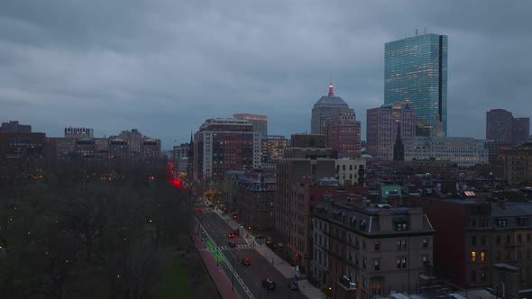 Evening Flight Above Park and Buildings in Urban Borough alt