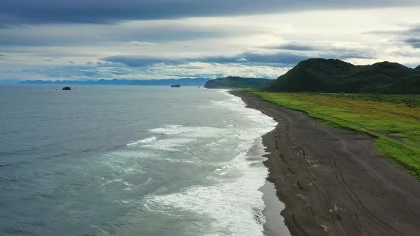 Beach with Black Sand on Kamchatka alt