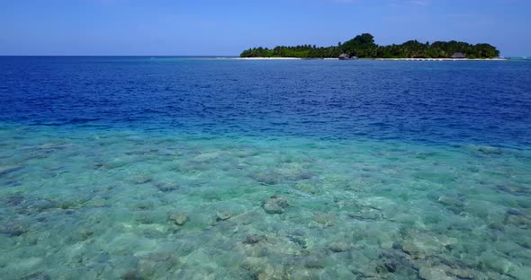 Natural birds eye travel shot of a paradise sunny white sand beach and blue water background in best alt