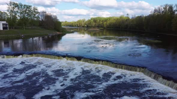 Flying Fish at Ventas Rumba Waterfall. The Widest Waterfall in Europe in Latvia Kuldiga Also Called alt