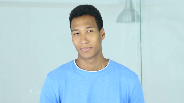 Positive Afro-American Man Looking in Camera alt