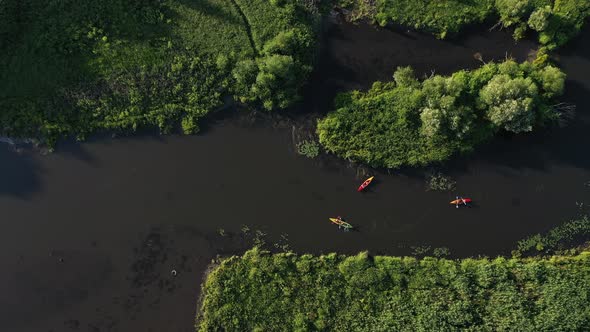 Top View of the Svisloch River Kayakers Floating on the River in the City's Loshitsky Park at Sunset alt